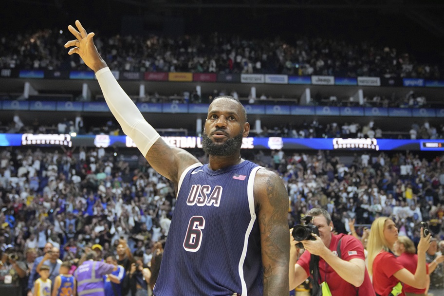 LeBron James waves to the crowd after a Team USA game.