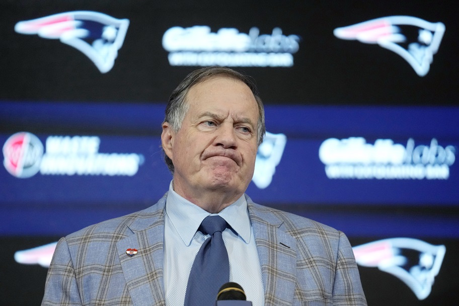 Bill Belichick answers a question during a press conference.