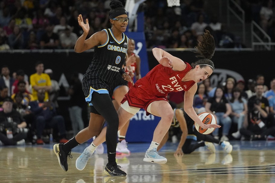 Cailtin Clark is knocked over by Diamond DeShields