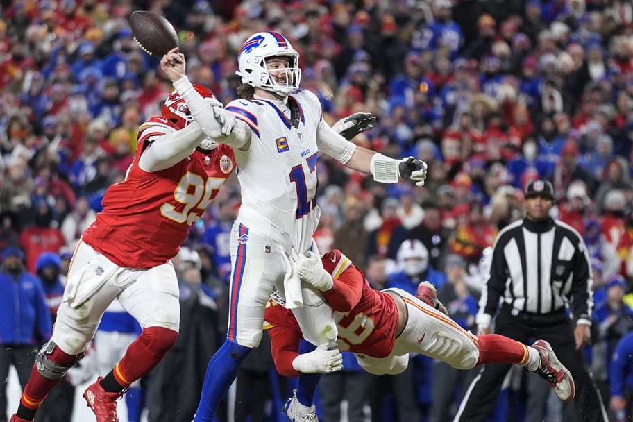 Buffalo's Josh Allen is hit throwing a pass against the Kansas City Chiefs.